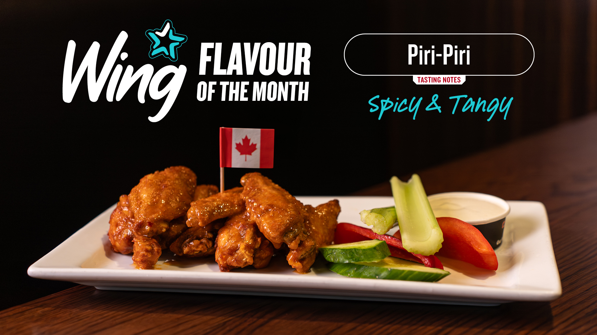 Piri-Piri Wing Flavour of the Month at The Canadian Icehouse, featuring sauced chicken wings with the tasting notes “Spicy & Tangy.”